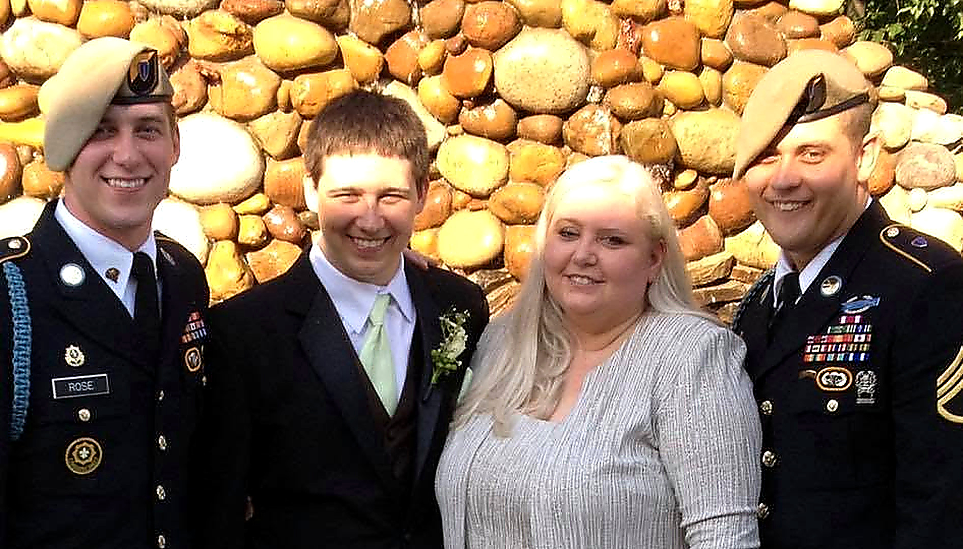 Terrie Rose with her three sons, all U.S. Army veterans and law enforcement officers